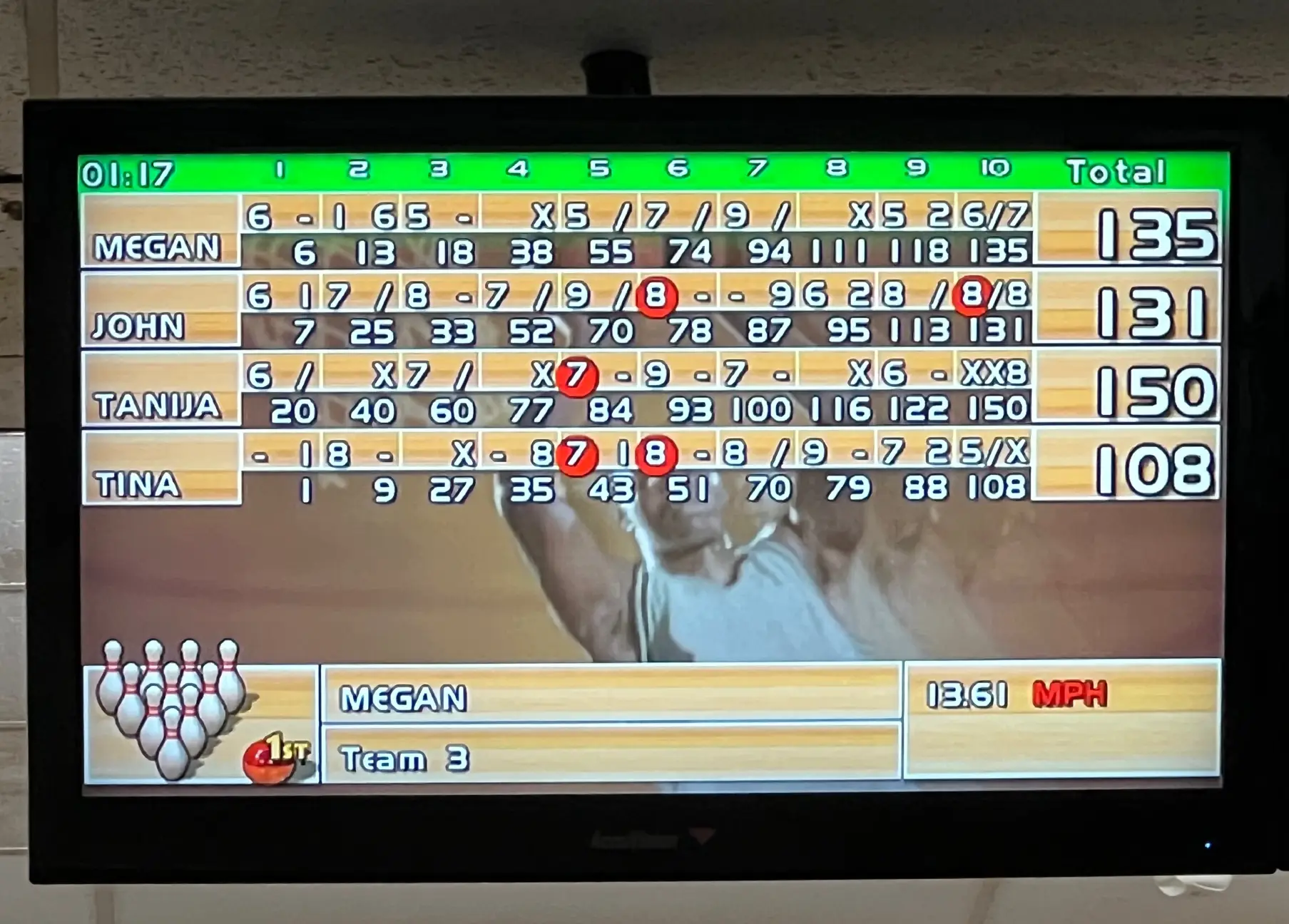 Screen with score for bowling in bowling alley